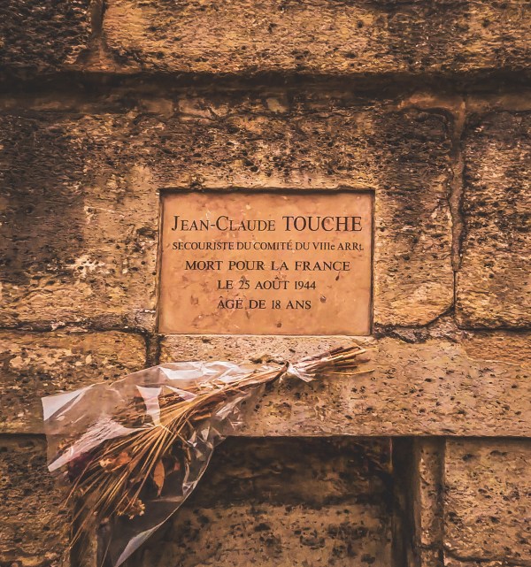 Memorial plaque in Paris commemorating a Resistance fighter who died during the Second World War.